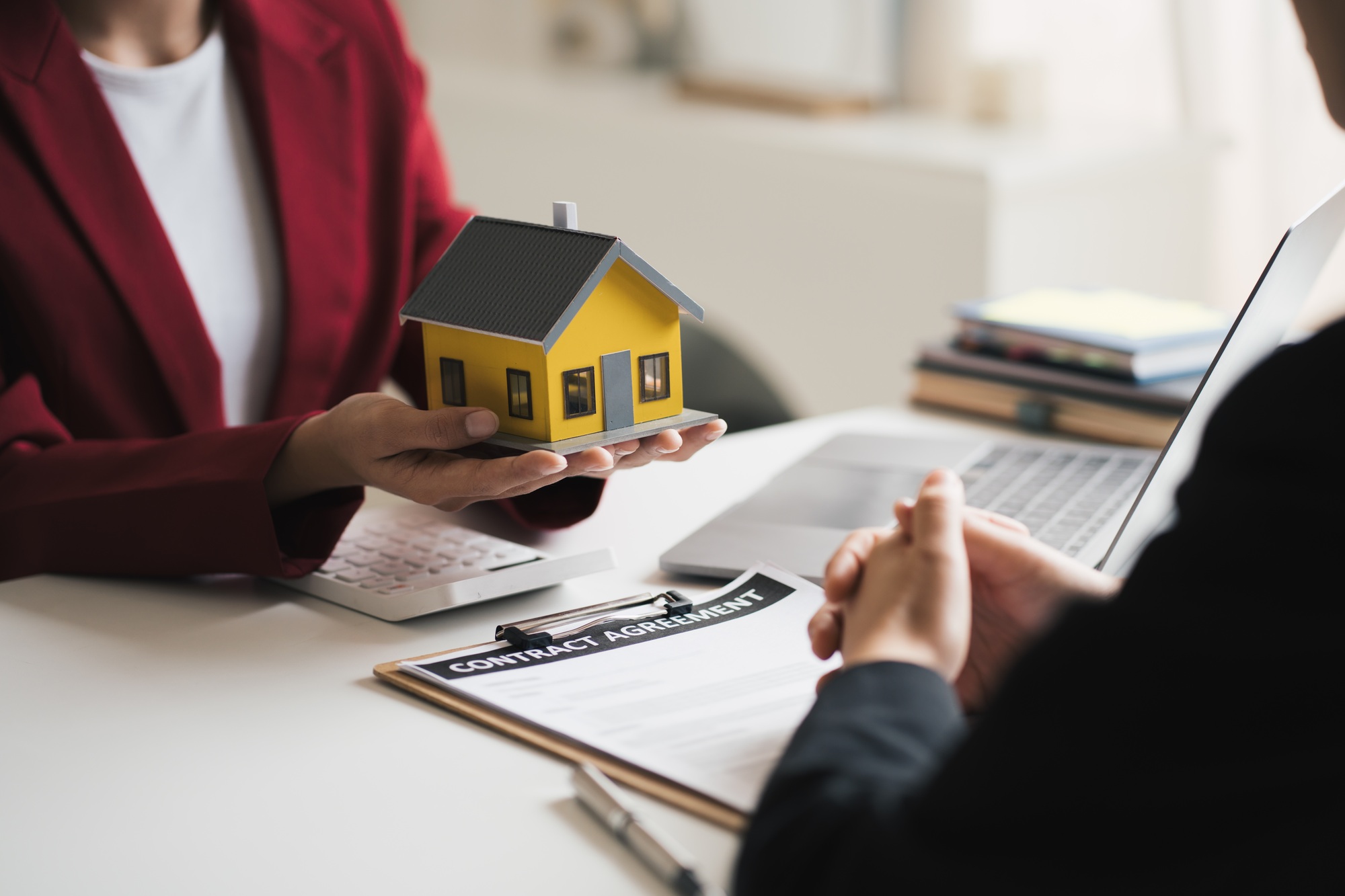 Real estate inheritance concept and contract agreement. The customer makes a rental contract with th