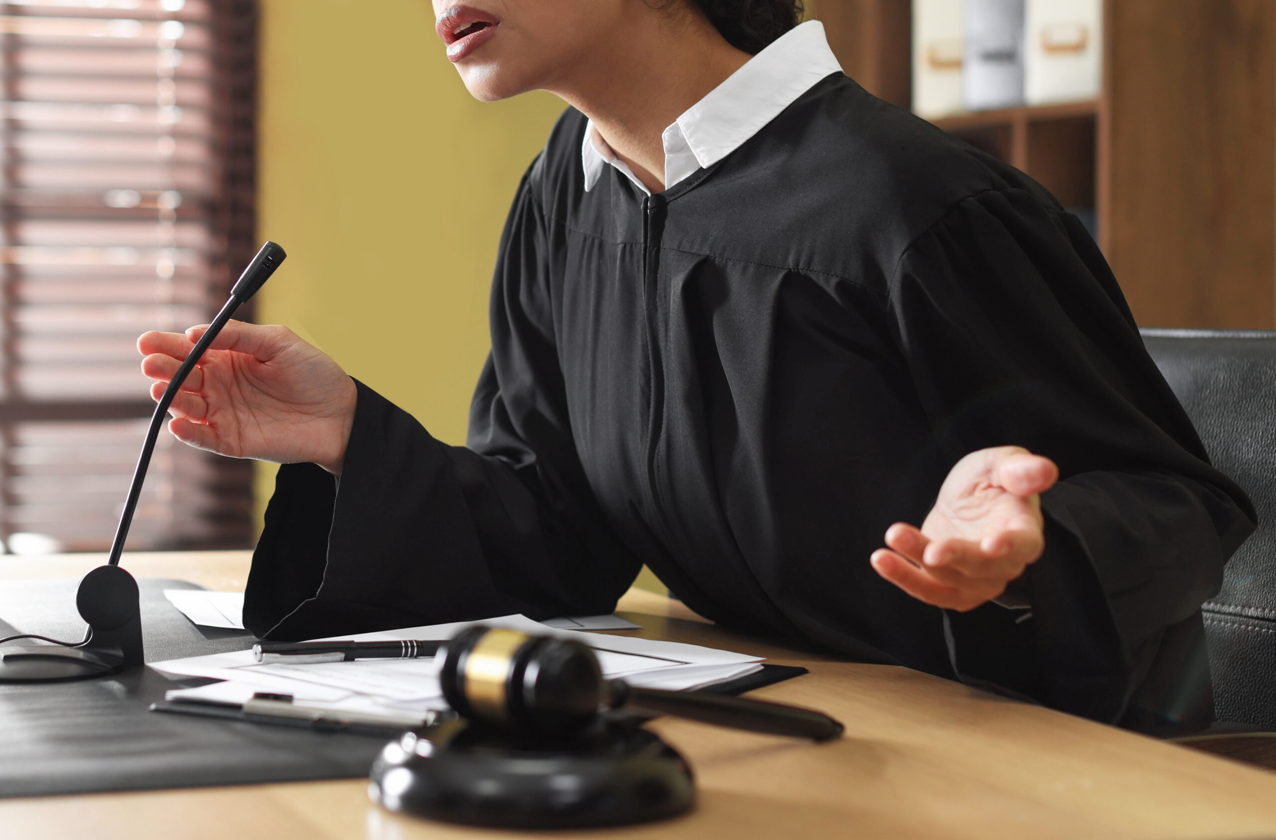 Bensalem Family Lawyer Supporting Your Family’s Future 36 Judge working at wooden desk in courtroom