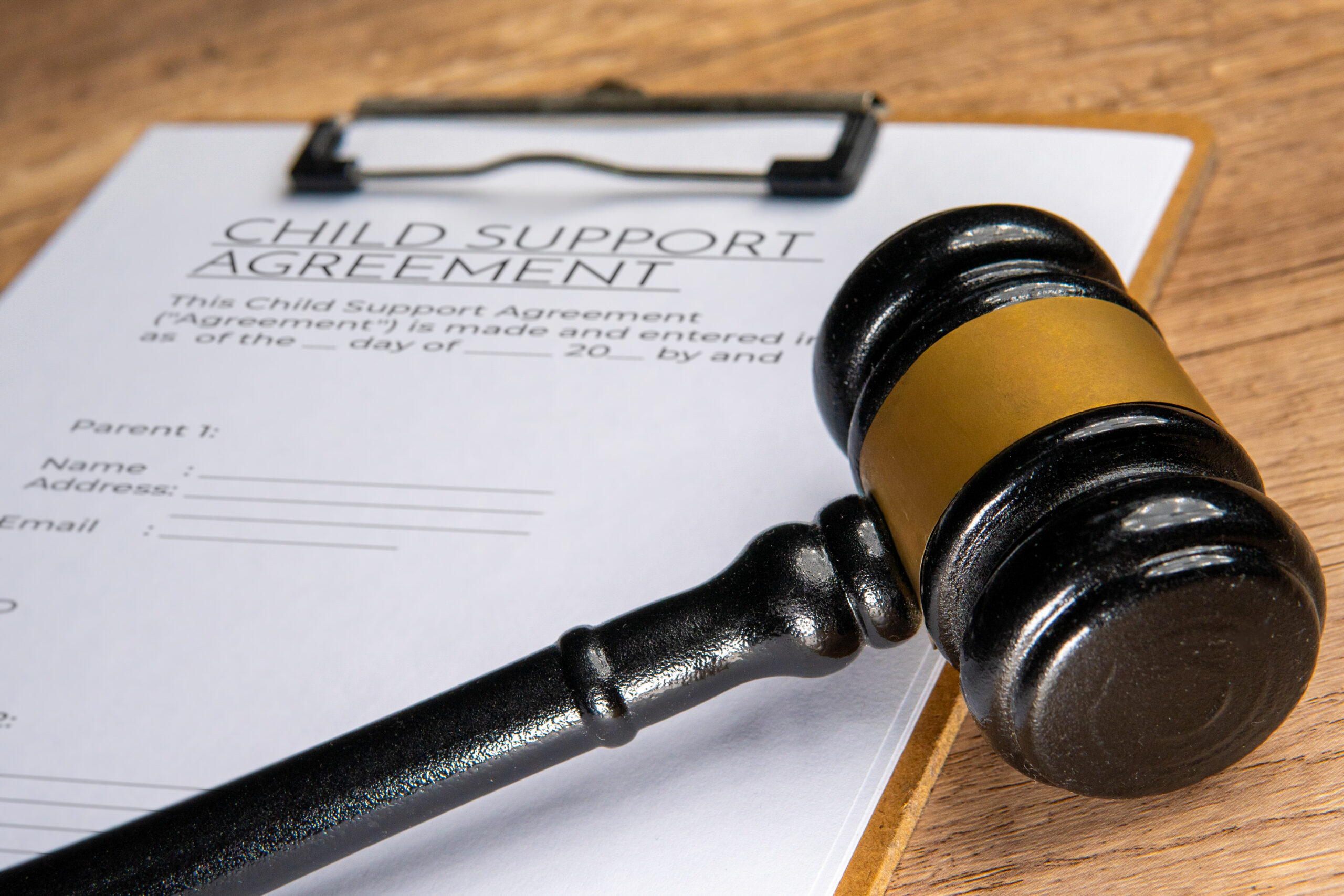 A gavel on a child support agreement document. Legal concept.